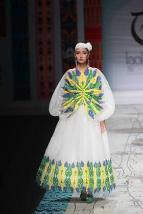 BEIJING, CHINA - OCTOBER 28: A model showcases designs on the runway at TaoLouLan by Tao Tao collection during the Mercedes-Benz China Fashion Week Spring Summer 2017 at the Banquet Hall of Beijing Hotel on October 28, 2016 in Beijing, China.  CFP494552906