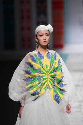 BEIJING, CHINA - OCTOBER 28: A model showcases designs on the runway at TaoLouLan by Tao Tao collection during the Mercedes-Benz China Fashion Week Spring Summer 2017 at the Banquet Hall of Beijing Hotel on October 28, 2016 in Beijing, China.  CFP494552909