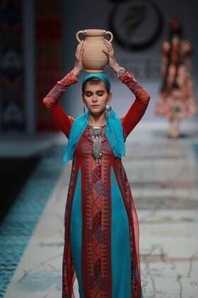 BEIJING, CHINA - OCTOBER 28: A model showcases designs on the runway at TaoLouLan by Tao Tao collection during the Mercedes-Benz China Fashion Week Spring Summer 2017 at the Banquet Hall of Beijing Hotel on October 28, 2016 in Beijing, China.  CFP494552914