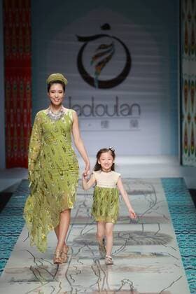 BEIJING, CHINA - OCTOBER 28: Models showcase designs on the runway at TaoLouLan by Tao Tao collection during the Mercedes-Benz China Fashion Week Spring Summer 2017 at the Banquet Hall of Beijing Hotel on October 28, 2016 in Beijing, China.  CFP494552910