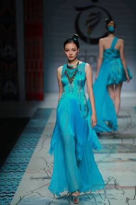 BEIJING, CHINA - OCTOBER 28: A model showcases designs on the runway at TaoLouLan by Tao Tao collection during the Mercedes-Benz China Fashion Week Spring Summer 2017 at the Banquet Hall of Beijing Hotel on October 28, 2016 in Beijing, China.  CFP494552927
