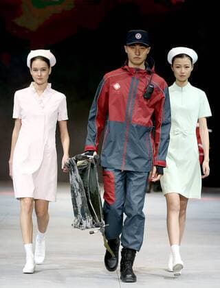Models present safety protection uniforms of the brand SWOTO by designer Liu Wei during the China Fashion Week in Beijing, capital of China, Oct. 28, 2016. ) (ry) CHINA-BEIJING-FASHION WEEK(CN) ChenxJianli 