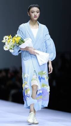 A model presents a creation at the HIKARI Cup 2016 China 3D Digital Fashion Design Contest during the China Fashion Week in Beijing, capital of China, Oct. 28, 2016. ) (ry) CHINA-BEIJING-FASHION WEEK (CN) ChenxJianli 