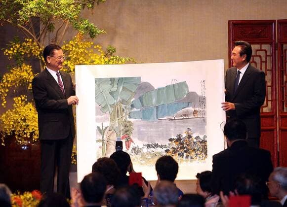 Nov 04, 2008 - Taipei, Taiwan, China - Chen Yunlin, chairman of China s Association for Relations Across the Taiwan Straits (ARATS), is on a five-day visit to Taiwan to discuss cross-strait issues with his Taiwan counterpart, Chiang Ping-kung, chairman of the Straits Exchange Foundation (SEF). Chen s arrival is the first high level visit to the island since it s split with the mainland during the 1949 civil war. PICTURED: China s top negotiator with Taiwan, CHEN YUNLIN receives a painting from honourary Nationalist Chairman LIEN CHAN (L) during a banquet in Taipei of Taiwan.  - ZUMAc32_ 20081104_jab_c32_643