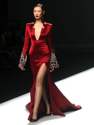 Chinese and European models wear clothing from the Maryma 2017 collection during China s international fashion week in Beijing on October 29, 2016. Chinese fashion designers are becoming an international force with both European and American fashion houses looking at the new, fresh Chinese clothing-minds as potential partners in future clothing brands.  PEK2016102901 STEPHENxSHAVER