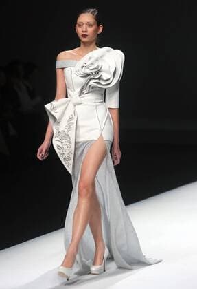 Chinese and European models wear clothing from the Maryma 2017 collection during China s international fashion week in Beijing on October 29, 2016. Chinese fashion designers are becoming an international force with both European and American fashion houses looking at the new, fresh Chinese clothing-minds as potential partners in future clothing brands.  PEK2016102910 STEPHENxSHAVER