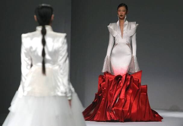 Chinese and European models wear clothing from the Maryma 2017 collection during China s international fashion week in Beijing on October 29, 2016. Chinese fashion designers are becoming an international force with both European and American fashion houses looking at the new, fresh Chinese clothing-minds as potential partners in future clothing brands.  PEK2016102922 STEPHENxSHAVER