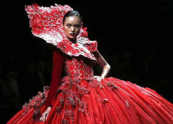 Chinese and European models wear clothing from the Maryma 2017 collection during China s international fashion week in Beijing on October 29, 2016. Chinese fashion designers are becoming an international force with both European and American fashion houses looking at the new, fresh Chinese clothing-minds as potential partners in future clothing brands.  PEK2016102926 STEPHENxSHAVER