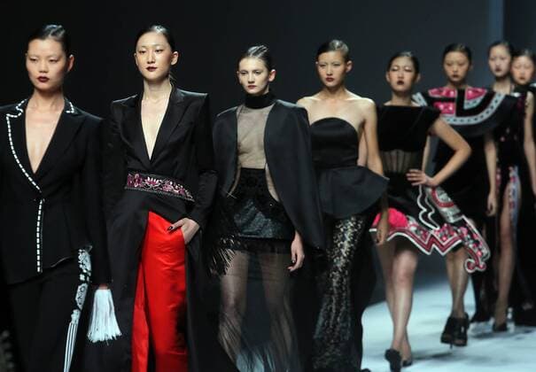 Chinese and European models wear clothing from the Maryma 2017 collection during China s international fashion week in Beijing on October 29, 2016. Chinese fashion designers are becoming an international force with both European and American fashion houses looking at the new, fresh Chinese clothing-minds as potential partners in future clothing brands.  PEK2016102927 STEPHENxSHAVER
