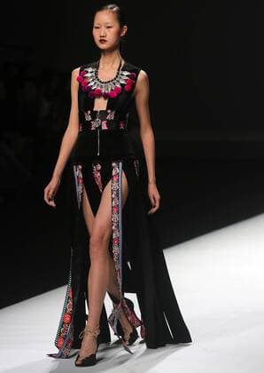Chinese and European models wear clothing from the Maryma 2017 collection during China s international fashion week in Beijing on October 29, 2016. Chinese fashion designers are becoming an international force with both European and American fashion houses looking at the new, fresh Chinese clothing-minds as potential partners in future clothing brands.  PEK2016102937 STEPHENxSHAVER