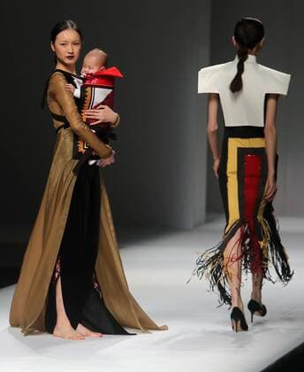 Chinese and European models wear clothing from the Maryma 2017 collection during China s international fashion week in Beijing on October 29, 2016. Chinese fashion designers are becoming an international force with both European and American fashion houses looking at the new, fresh Chinese clothing-minds as potential partners in future clothing brands.  PEK2016102939 STEPHENxSHAVER