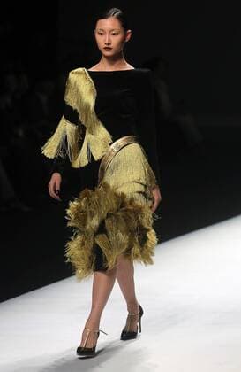 Chinese and European models wear clothing from the Maryma 2017 collection during China s international fashion week in Beijing on October 29, 2016. Chinese fashion designers are becoming an international force with both European and American fashion houses looking at the new, fresh Chinese clothing-minds as potential partners in future clothing brands.  PEK2016102940 STEPHENxSHAVER