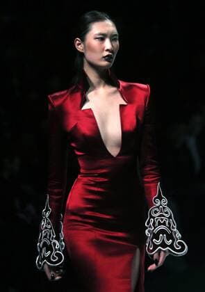 Chinese and European models wear clothing from the Maryma 2017 collection during China s international fashion week in Beijing on October 29, 2016. Chinese fashion designers are becoming an international force with both European and American fashion houses looking at the new, fresh Chinese clothing-minds as potential partners in future clothing brands.  PEK2016102902 STEPHENxSHAVER