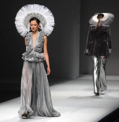 Chinese and European models wear clothing from the Maryma 2017 collection during China s international fashion week in Beijing on October 29, 2016. Chinese fashion designers are becoming an international force with both European and American fashion houses looking at the new, fresh Chinese clothing-minds as potential partners in future clothing brands.  PEK2016102905 STEPHENxSHAVER
