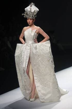 Chinese and European models wear clothing from the Maryma 2017 collection during China s international fashion week in Beijing on October 29, 2016. Chinese fashion designers are becoming an international force with both European and American fashion houses looking at the new, fresh Chinese clothing-minds as potential partners in future clothing brands.  PEK2016102921 STEPHENxSHAVER