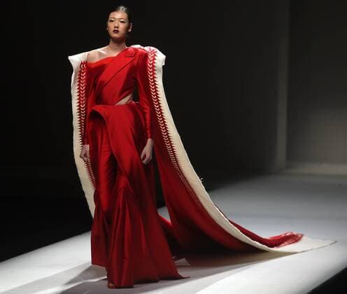 Chinese and European models wear clothing from the Maryma 2017 collection during China s international fashion week in Beijing on October 29, 2016. Chinese fashion designers are becoming an international force with both European and American fashion houses looking at the new, fresh Chinese clothing-minds as potential partners in future clothing brands.  PEK2016102924 STEPHENxSHAVER