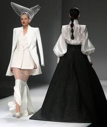 Chinese and European models wear clothing from the Maryma 2017 collection during China s international fashion week in Beijing on October 29, 2016. Chinese fashion designers are becoming an international force with both European and American fashion houses looking at the new, fresh Chinese clothing-minds as potential partners in future clothing brands.  PEK2016102943 STEPHENxSHAVER