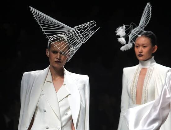 Chinese and European models wear clothing from the Maryma 2017 collection during China s international fashion week in Beijing on October 29, 2016. Chinese fashion designers are becoming an international force with both European and American fashion houses looking at the new, fresh Chinese clothing-minds as potential partners in future clothing brands.  PEK2016102999 STEPHENxSHAVER