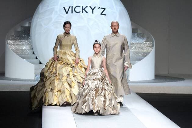 BEIJING, CHINA - OCTOBER 29: Actor Ren Zhong and two models showcase designs on the runway at Vicky Zhang Collection during the Mercedes-Benz China Fashion Week Spring Summer 2017 at the Banquet Hall of Beijing Hotel on October 29, 2016 in Beijing, China.  CFP494616486
