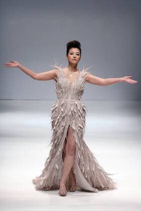 BEIJING, CHINA - OCTOBER 29: Actress Kathy Chow showcases designs on the runway at Jusere collection during the Mercedes-Benz China Fashion Week Spring Summer 2017 at 751D Park on October 29, 2016 in Beijing, China.  CFP494621757