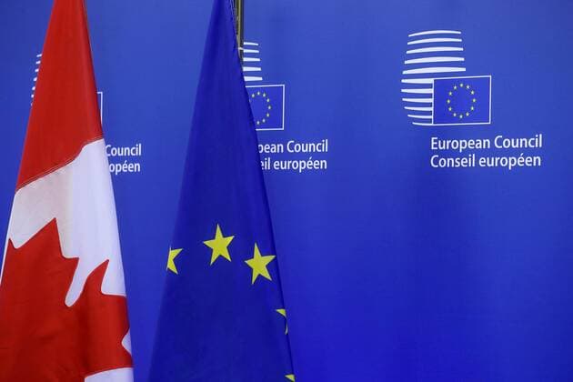 Illustration picture shows the Canadian and European flags at the EU-Canada summit meeting, Sunday 30 October 2016, at the European Union headquarters in Brussels. EU leaders and Canada will sign at Today s summit the Comprehensive Economic and Trade Agreement (CETA). The signing of the treaty was delayed by the refusal of the Belgian Walloon and Brussels Region.  NICOLASxMAETERLINCK 04969053