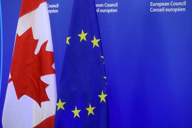 Bilder des Tages Illustration picture shows the Canadian and European flags at the EU-Canada summit meeting, Sunday 30 October 2016, at the European Union headquarters in Brussels. EU leaders and Canada will sign at Today s summit the Comprehensive Economic and Trade Agreement (CETA). The signing of the treaty was delayed by the refusal of the Belgian Walloon and Brussels Region.  NICOLASxMAETERLINCK 04969055