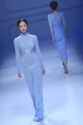 BEIJING, CHINA - OCTOBER 30: A model showcases designs on the runway at Snow Lotus collection by Tanya Wang during the Mercedes-Benz China Fashion Week Spring Summer 2017 at Banquet Hall of Beijing Hotel on October 30, 2016 in Beijing, China.  CFP494701524