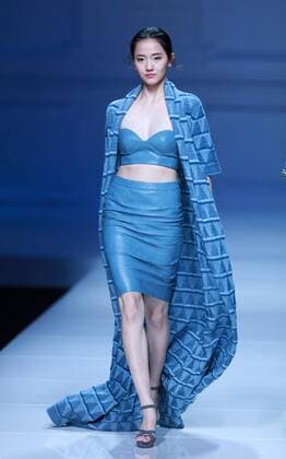 BEIJING, CHINA - OCTOBER 30: A model showcases designs on the runway at Snow Lotus collection by Tanya Wang during the Mercedes-Benz China Fashion Week Spring Summer 2017 at Banquet Hall of Beijing Hotel on October 30, 2016 in Beijing, China.  CFP494679686