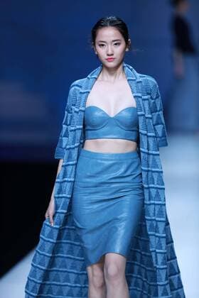 BEIJING, CHINA - OCTOBER 30: A model showcases designs on the runway at Snow Lotus collection by Tanya Wang during the Mercedes-Benz China Fashion Week Spring Summer 2017 at Banquet Hall of Beijing Hotel on October 30, 2016 in Beijing, China.  CFP494679705