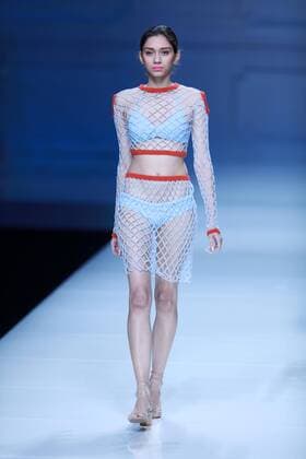 BEIJING, CHINA - OCTOBER 30: A model showcases designs on the runway at Snow Lotus collection by Tanya Wang during the Mercedes-Benz China Fashion Week Spring Summer 2017 at Banquet Hall of Beijing Hotel on October 30, 2016 in Beijing, China.  CFP494679694