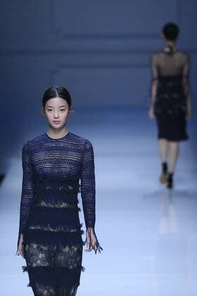 BEIJING, CHINA - OCTOBER 30: A model showcases designs on the runway at Snow Lotus collection by Tanya Wang during the Mercedes-Benz China Fashion Week Spring Summer 2017 at Banquet Hall of Beijing Hotel on October 30, 2016 in Beijing, China.  CFP494701513