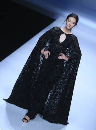 BEIJING, CHINA - OCTOBER 30: A model showcases designs on the runway at Snow Lotus collection by Tanya Wang during the Mercedes-Benz China Fashion Week Spring Summer 2017 at Banquet Hall of Beijing Hotel on October 30, 2016 in Beijing, China.  CFP494701523