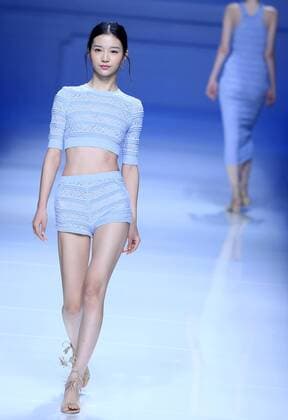BEIJING, CHINA - OCTOBER 30: A model showcases designs on the runway at Snow Lotus collection by Tanya Wang during the Mercedes-Benz China Fashion Week Spring Summer 2017 at Banquet Hall of Beijing Hotel on October 30, 2016 in Beijing, China.  CFP494701514