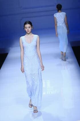 BEIJING, CHINA - OCTOBER 30: A model showcases designs on the runway at Snow Lotus collection by Tanya Wang during the Mercedes-Benz China Fashion Week Spring Summer 2017 at Banquet Hall of Beijing Hotel on October 30, 2016 in Beijing, China.  CFP494701520