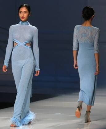 Chinese and European models wear clothing from the Lotus 2017 collection during China s international fashion week in Beijing on October 31, 2016. Chinese fashion designers are becoming an international force with both European and American fashion houses looking at the new, fresh Chinese clothing-minds as potential partners in future clothing brands.  PEK2016103105 STEPHENxSHAVER