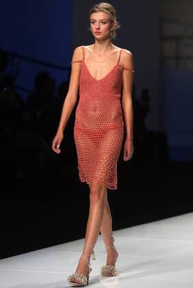 Chinese and European models wear clothing from the Lotus 2017 collection during China s international fashion week in Beijing on October 31, 2016. Chinese fashion designers are becoming an international force with both European and American fashion houses looking at the new, fresh Chinese clothing-minds as potential partners in future clothing brands.  PEK2016103119 STEPHENxSHAVER