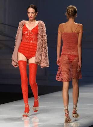Chinese and European models wear clothing from the Lotus 2017 collection during China s international fashion week in Beijing on October 31, 2016. Chinese fashion designers are becoming an international force with both European and American fashion houses looking at the new, fresh Chinese clothing-minds as potential partners in future clothing brands.  PEK2016103120 STEPHENxSHAVER