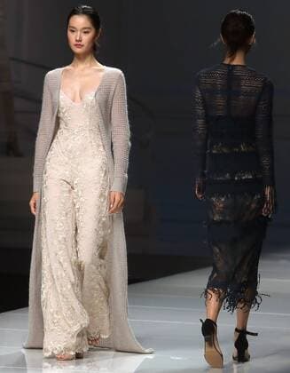 Chinese and European models wear clothing from the Lotus 2017 collection during China s international fashion week in Beijing on October 31, 2016. Chinese fashion designers are becoming an international force with both European and American fashion houses looking at the new, fresh Chinese clothing-minds as potential partners in future clothing brands.  PEK2016103126 STEPHENxSHAVER