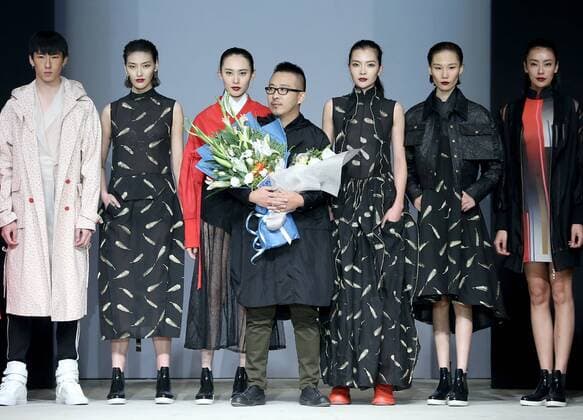 BEIJING, Nov. 1, 2016 -- Designer Chen Yu (C) makes a curtain call with models during the China Fashion Week in Beijing, capital of China, Nov. 1, 2016. ) (ssx) CHINA-BEIJING-FASHION-WEEK(CN) ChenxJianli 