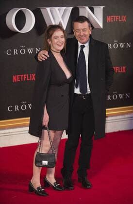 The Crown World Premiere London, UK. Peter Morgan and Partner at the World Premiere of new Netflix Original series The Crown at Odeon Leicester Square on November 1, 2016 in London, England. LMK386 -61210-021116 