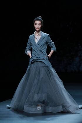 BEIJING, CHINA - NOVEMBER 01: Actress Che Xiao showcases designs on the runway at AM.IXAM collection by Ma Ying during the Mercedes-Benz China Fashion Week Spring Summer 2017 at Banquet Hall of Beijing Hotel on November 1, 2016 in Beijing, China.  CFP494828329