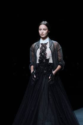 BEIJING, CHINA - NOVEMBER 01: A model showcases designs on the runway at AM.IXAM collection by Ma Ying during the Mercedes-Benz China Fashion Week Spring Summer 2017 at Banquet Hall of Beijing Hotel on November 1, 2016 in Beijing, China.  CFP494828336