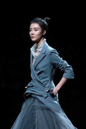 BEIJING, CHINA - NOVEMBER 01: Actress Che Xiao showcases designs on the runway at AM.IXAM collection by Ma Ying during the Mercedes-Benz China Fashion Week Spring Summer 2017 at Banquet Hall of Beijing Hotel on November 1, 2016 in Beijing, China.  CFP494828344