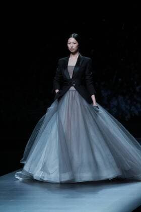 BEIJING, CHINA - NOVEMBER 01: A model showcases designs on the runway at AM.IXAM collection by Ma Ying during the Mercedes-Benz China Fashion Week Spring Summer 2017 at Banquet Hall of Beijing Hotel on November 1, 2016 in Beijing, China.  CFP494828352