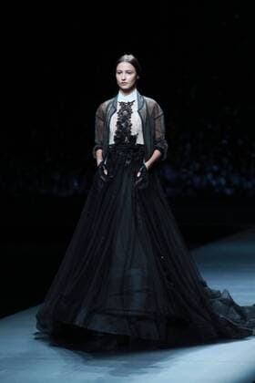 BEIJING, CHINA - NOVEMBER 01: A model showcases designs on the runway at AM.IXAM collection by Ma Ying during the Mercedes-Benz China Fashion Week Spring Summer 2017 at Banquet Hall of Beijing Hotel on November 1, 2016 in Beijing, China.  CFP494828353