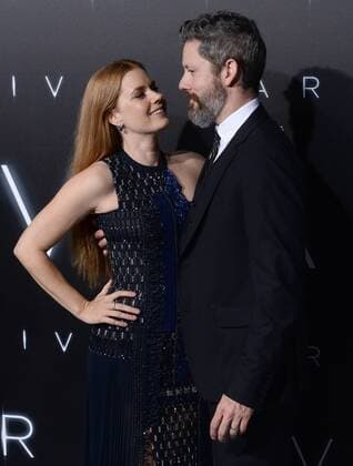 Cast member Amy Adams and her husband, actor Darren Le Gallo attend the premiere of the motion picture sci-fi thriller Arrival at the Regency Village Theatre in the Westwood section of Los Angeles on November 6, 2016. Storyline: When mysterious spacecraft touch down across the globe, an elite team - led by expert linguist Louise Banks (Amy Adams) - are brought together to investigate. As mankind teeters on the verge of global war, Banks and the team race against time for answers - and to find them, she will take a chance that could threaten her life, and quite possibly humanity.  LAP2016110609 JIMxRUYMEN