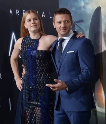 Cast members Amy Adams and Jeremy Renner attend the premiere of the motion picture sci-fi thriller Arrival at the Regency Village Theatre in the Westwood section of Los Angeles on November 6, 2016. Storyline: When mysterious spacecraft touch down across the globe, an elite team - led by expert linguist Louise Banks (Amy Adams) - are brought together to investigate. As mankind teeters on the verge of global war, Banks and the team race against time for answers - and to find them, she will take a chance that could threaten her life, and quite possibly humanity.  LAP2016110613 JIMxRUYMEN