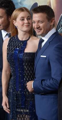 Cast members Amy Adams and Jeremy Renner attend the premiere of the motion picture sci-fi thriller Arrival at the Regency Village Theatre in the Westwood section of Los Angeles on November 6, 2016. Storyline: When mysterious spacecraft touch down across the globe, an elite team - led by expert linguist Louise Banks (Amy Adams) - are brought together to investigate. As mankind teeters on the verge of global war, Banks and the team race against time for answers - and to find them, she will take a chance that could threaten her life, and quite possibly humanity.  LAP2016110614 JIMxRUYMEN