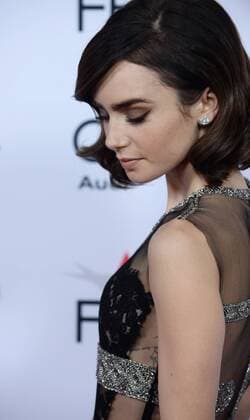 Cast member Lily Collins attends the premiere of the motion picture dramatic comedy Rules Don t Apply at TCL Chinese Theatre in the Hollywood section of Los Angeles on November 10, 2016. Storyline: An unconventional love story of an aspiring actress, her determined driver, and the eccentric billionaire who they work for.  LAP2016111015 JIMxRUYMEN