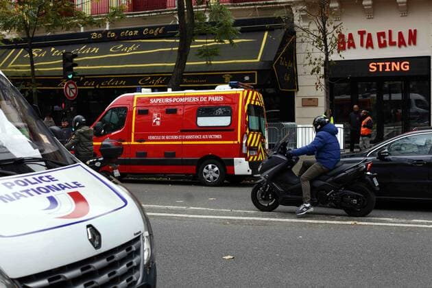 November 12, 2016 - Paris, France - People cross the street in front of the Bataclan concert hall in Paris on November 12, 2016, a few hours before the reopening concert by British musician Sting to mark the first anniversary of the November 13 Paris attacks. Le Bataclan, the live music venue at the centre of the 13 Nov 2015 Paris terror attacks, reopens for the first time since the tragedy with a performance by Sting on the eve of the 1st anniversary. Paris France  - ZUMAn230 20161112_zaa_n230_024